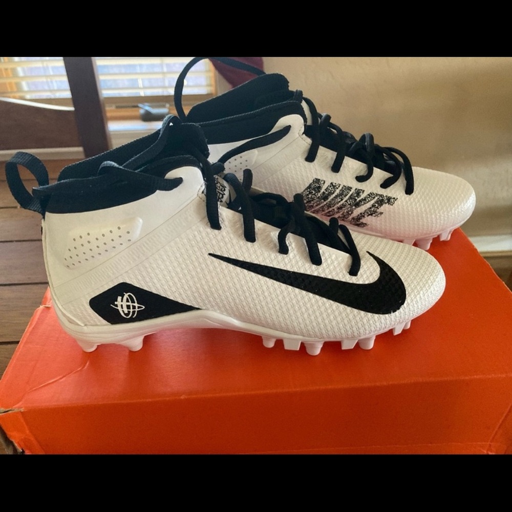 Nike lacrosse cleats, new. Too big for my daughter so reselling.